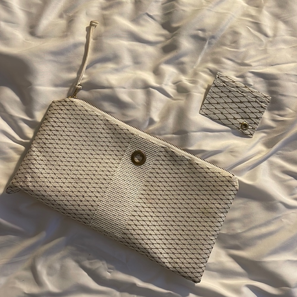 Alaina Marie Brand Portland Maine
Gold & White Metallic Clutch & Card Holder